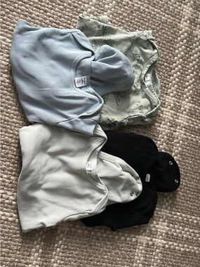 Set of Nordstrom Ribbed Baby Onesies in Light Blue, Sage, Cream, and Black